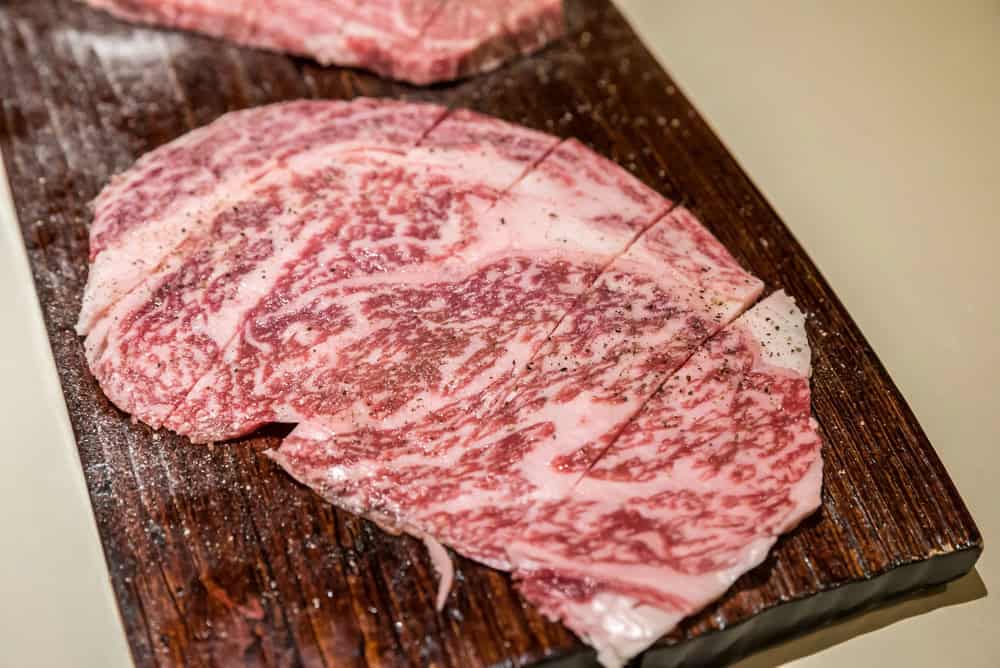 a slice of raw wagyu beef